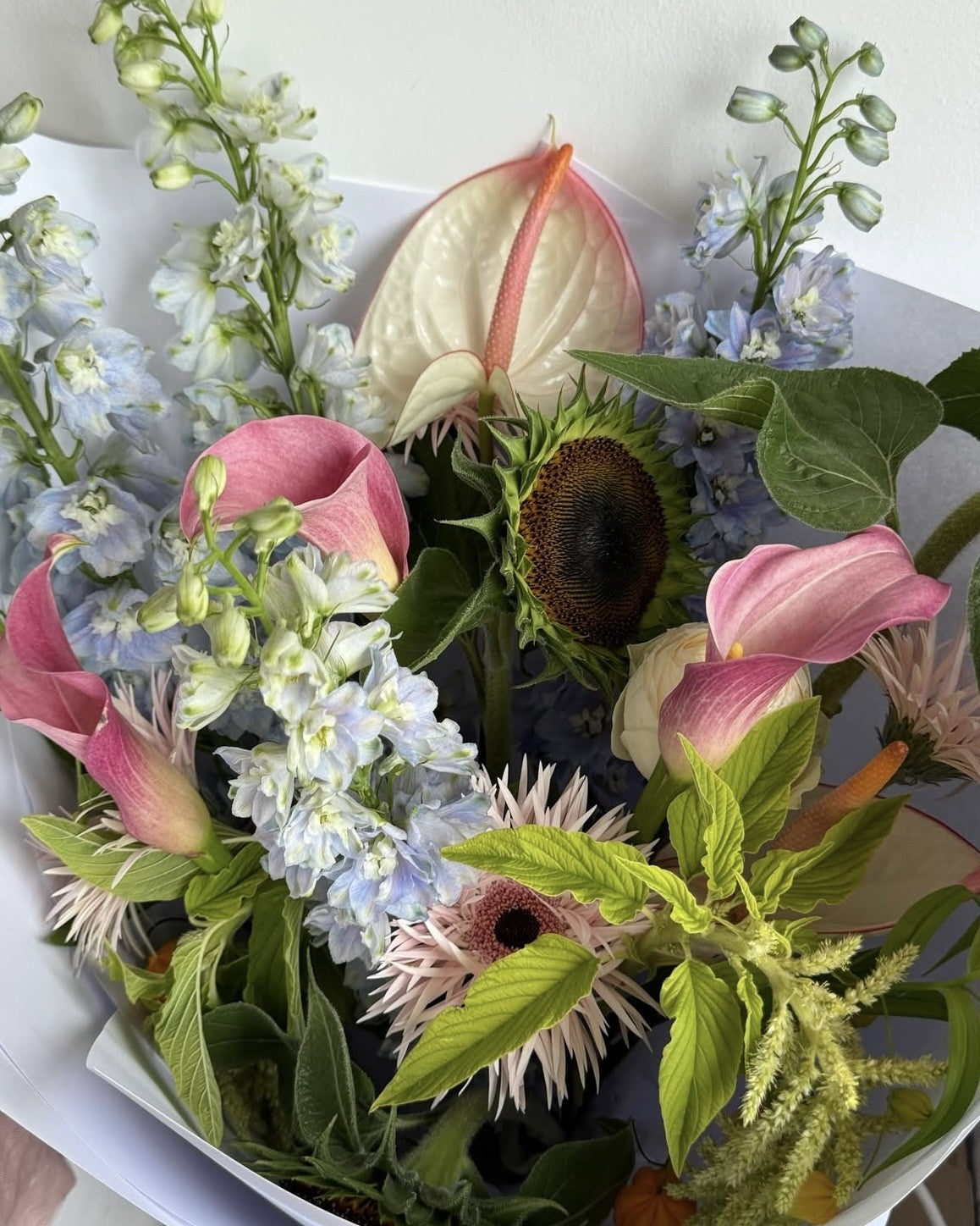 A curated flower kit subscription with seasonal blooms and arranging tools delivered to your home